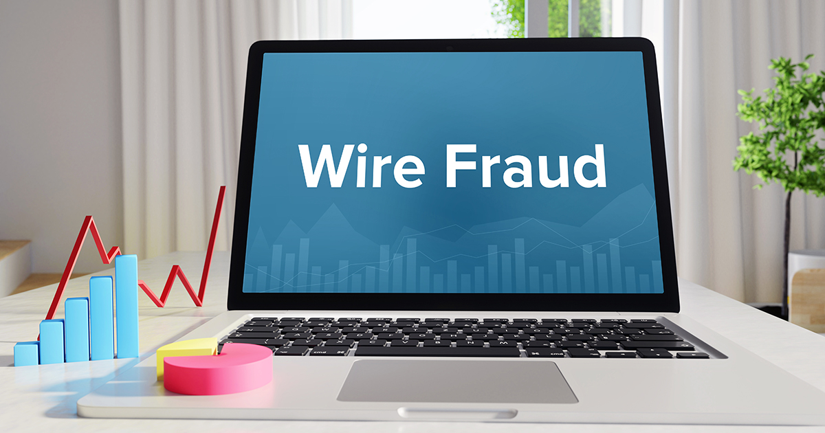 Wire Fraud – Statistics/Business. Laptop in the office with te